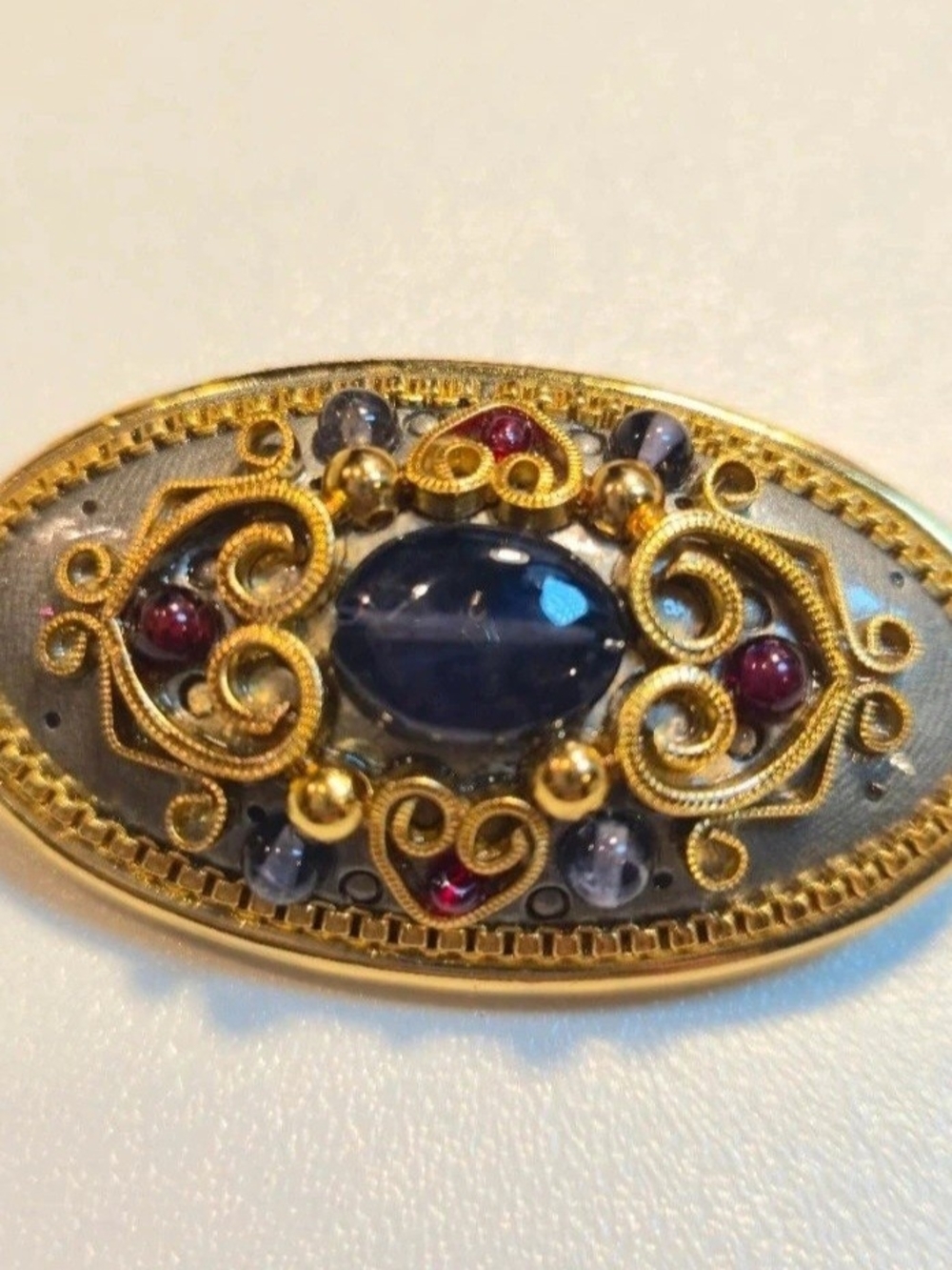 Michal Golan,Gold-Tone Filigree Brooch with Blue Center Stone and Pink Accents